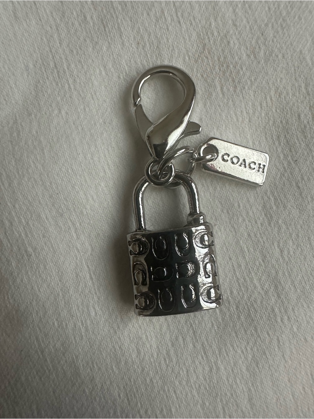 Coach Silver Tone Padlock mini Charm with Logo Tag
